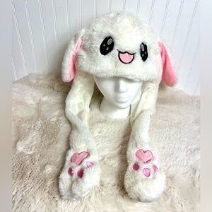 Plush bunny hat with moveable ear flaps ( inflatable bulb in scarf)